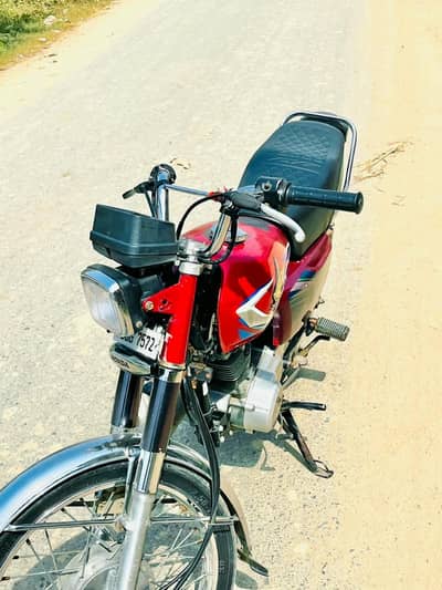 Honda 125 red colour all ok