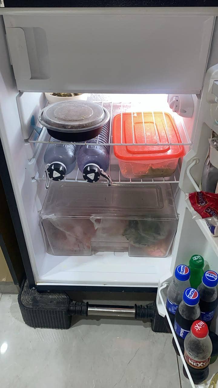 Dawlance mini refrigerator 9