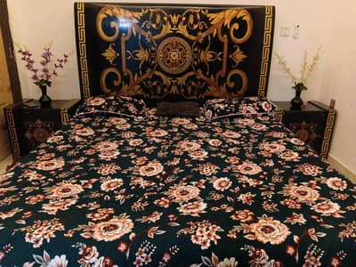 wooden bed with 2side draws