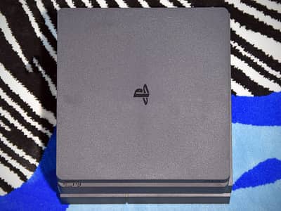 PS4 Slim 1TB + 2 Controllers | 1 Year Used | Excellent Condition