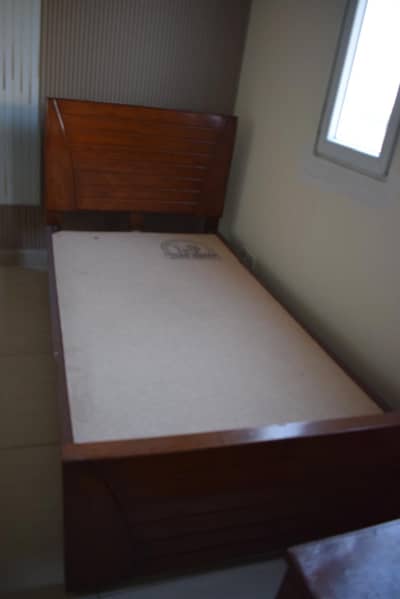 3 beds with side tables