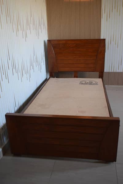 3 beds with side tables