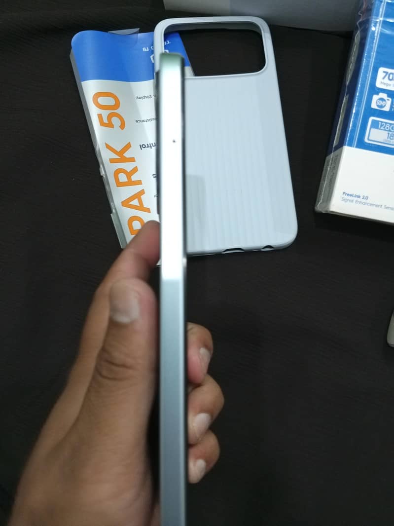Tecno Spark 50 7