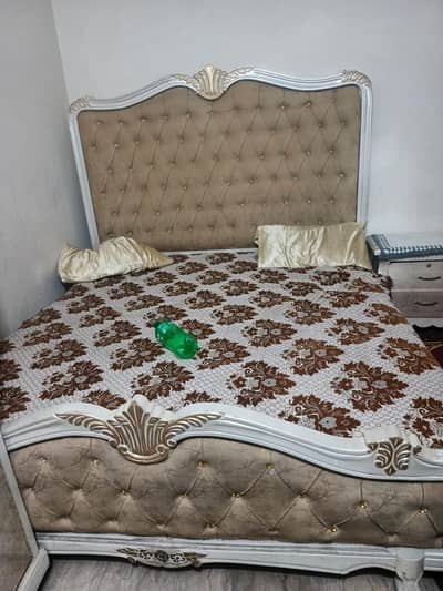 bed with bed side tables , dressing table and single Almirah