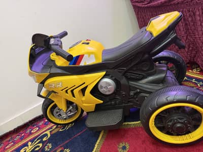 Kids new 3 wheeler , chargeable