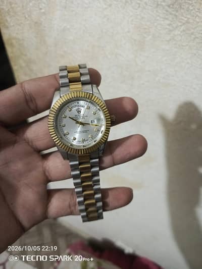 Rolex date and day with tutone colour watch