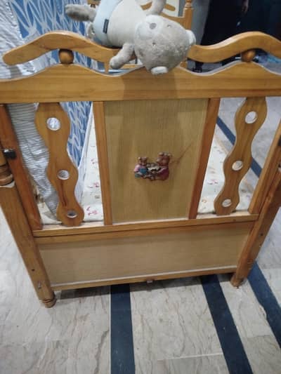 baby crib as fixed as shown on side down