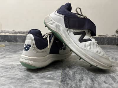 New Balance Spikes Shoes