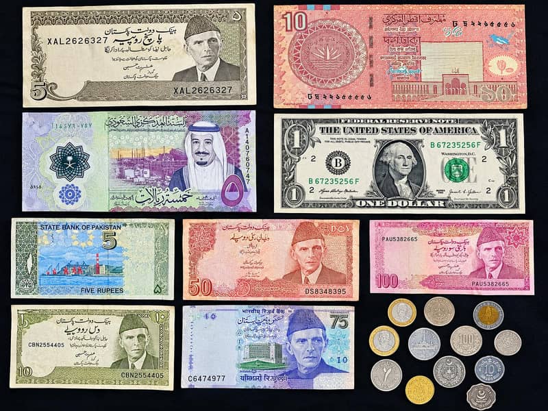 Notes and coins from different countries 0