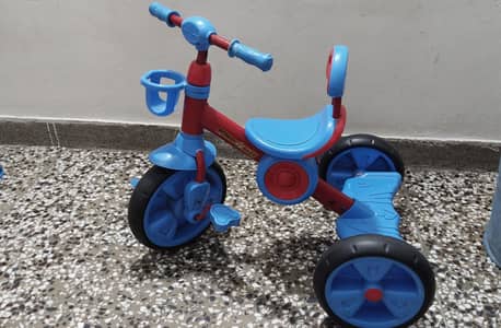 Power baby tricycle for kids - Blue & Red - Excellent condition.