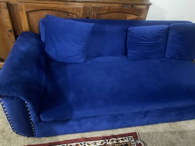 L shaped sofa and center tabla