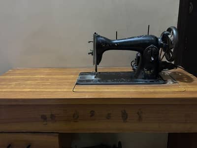 Sewing machine with stand