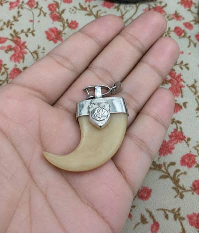 lion nail pendant