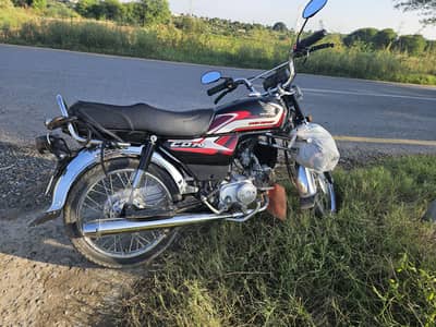 Honda 70 black 10/10 for sale and exchange with 125