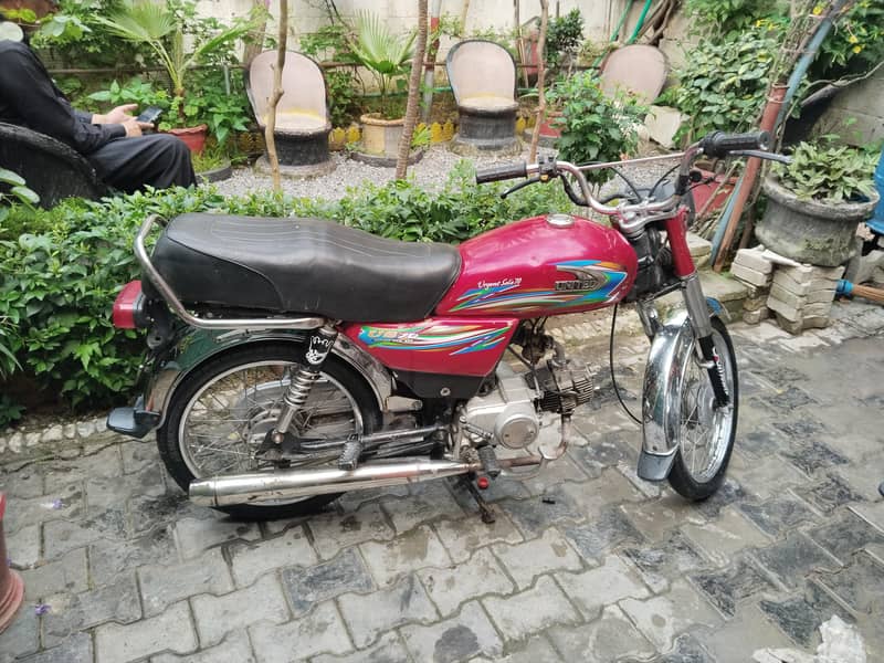 United 70cc 6