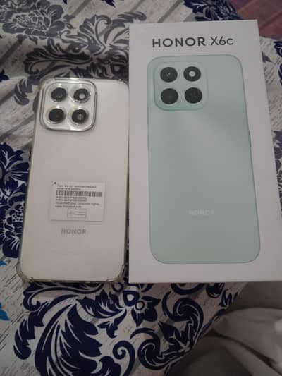 honor moblie 6 gb ram and 128 gb 4 months warranty ha baki abi neat