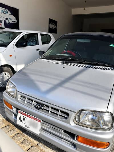 2005 Daihatsu Coure Silver – Excellent Condition – Smooth Drive