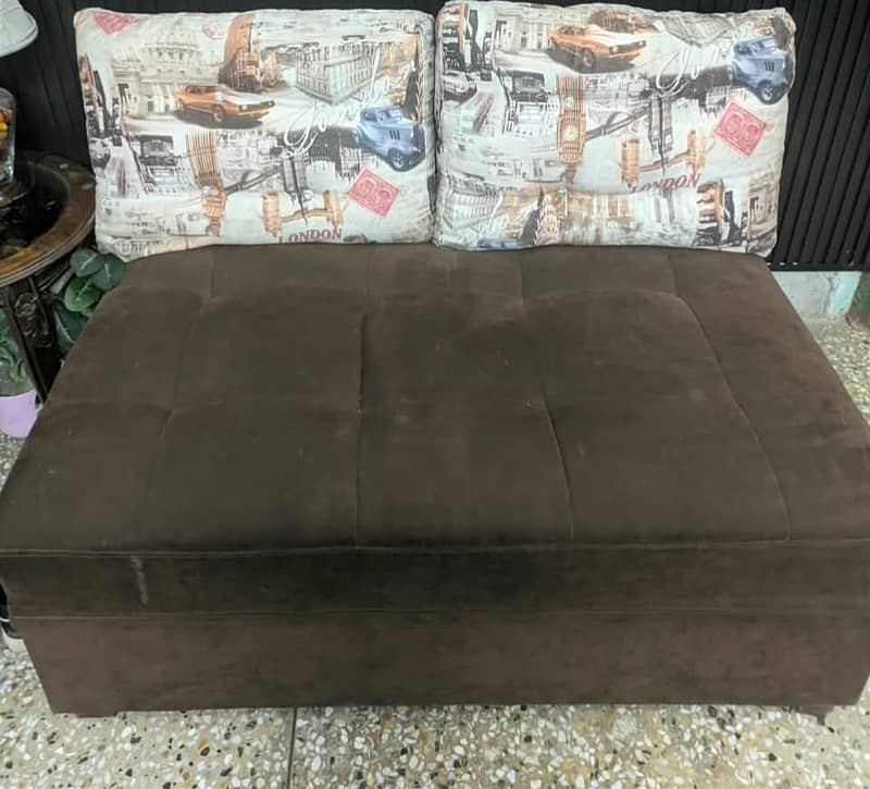 2 seater brown sofa 0
