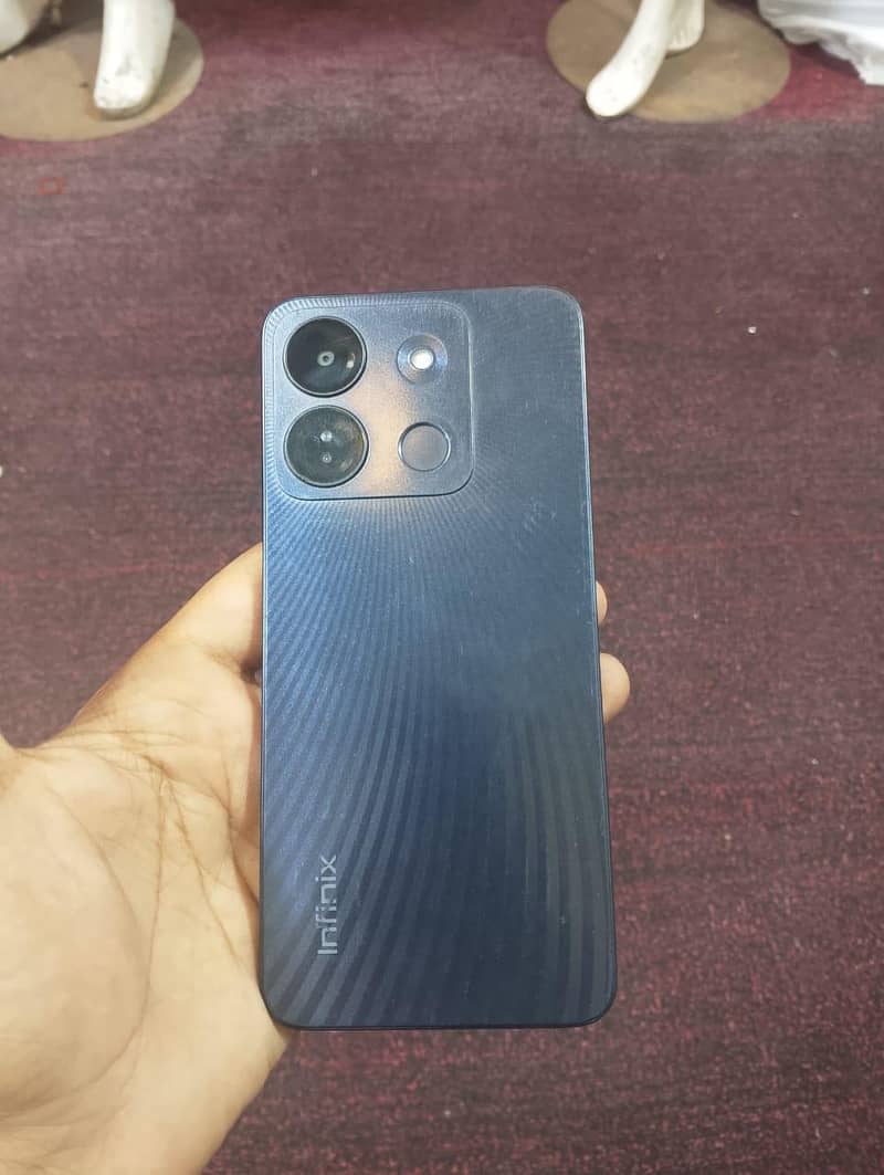 Infinix Smart 7 6