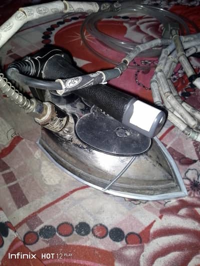 Industrial electric steam iron
