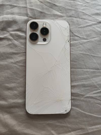 Apple iPhone 16 Pro Max. Back Crack Factory Unlocked