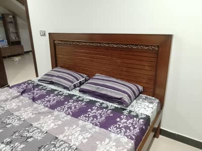 king Size Wooden bed Color Brown