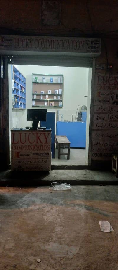 MOBILE SHOP WITH SHELVES AND RACKS