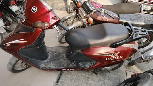 United US Scooty 100cc (Automatic) – Excellent Condition