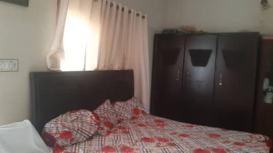 bed and almari