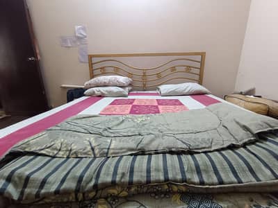 Iron rod bed with mattress
