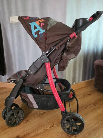 Junior Brand Baby Pram - Very Good Condition