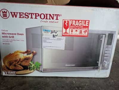 Deluxe Microwave Oven with Grill*  _5 Microwave power levels_ _0-99 m