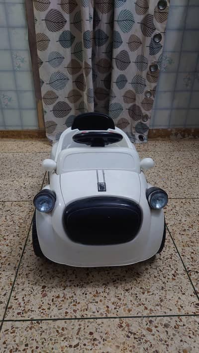 RECHARGEABLE BATTERY OPERATED CAR PANDA THEME CONDITION LIKE NEW