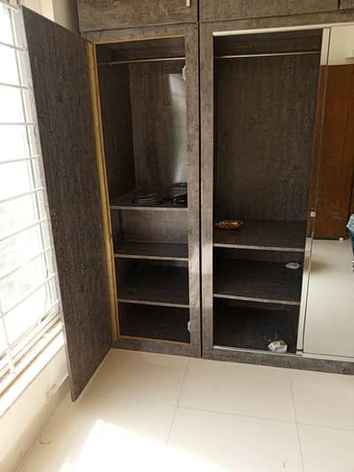 Grey sliding mirror wardrobe,  price  negotiable