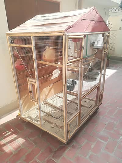 Wooden cage for parrots
