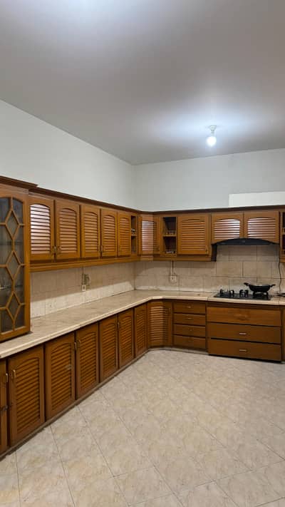 F-8 Excellent Double Story House Spacious 1 Kanal House Proper 5 Bedrooms, 5 Attached Bathrooms Modern Fittings Along With Marble Flooring Drawing Dining, TV Lounge, Kitchen
