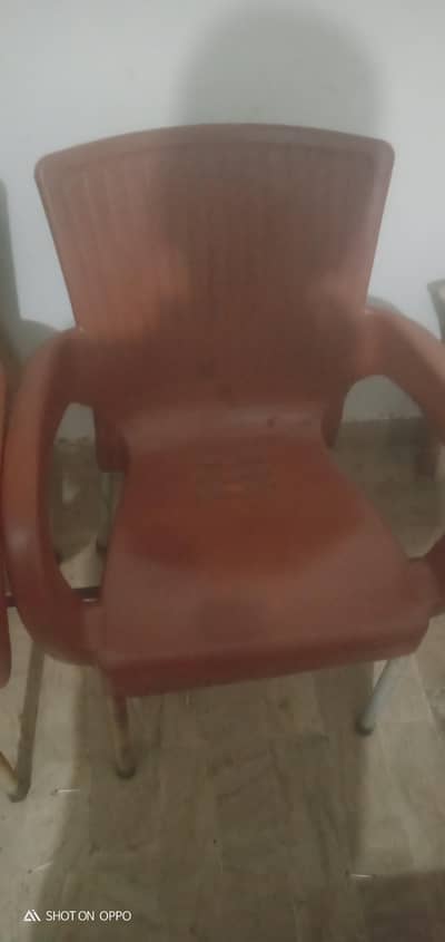 3- Plastic Chairs for sale 1000/- each. A Charpai for 5000/-almost new