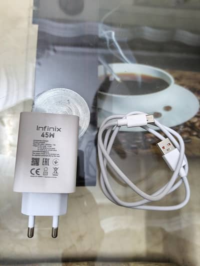 Infinix 45 wat original box wala charger hay
