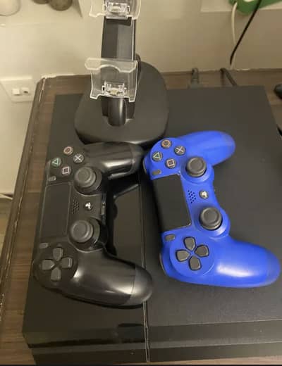 Ps4 (1000gb) 1TB JAILBREAK with 2 CONTROLLERS,DUAL SHOCK CHARGING DOCK