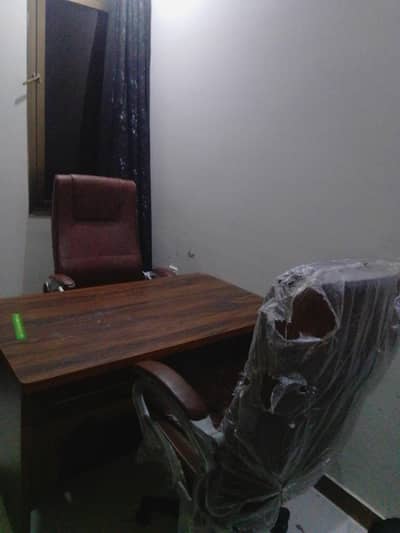 Office table and 2 Medicated chairs.