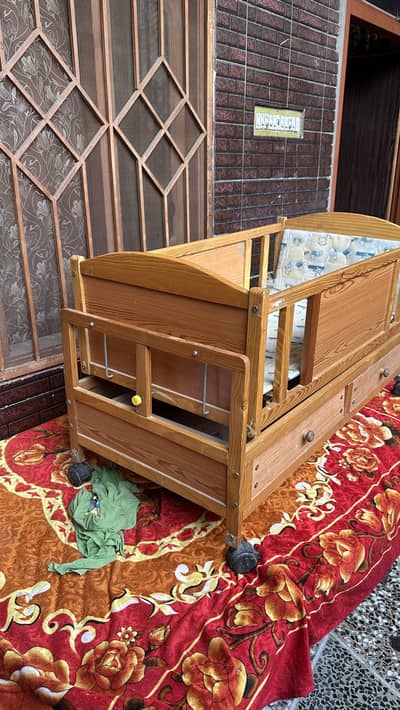wooden baby cot (or baby crib