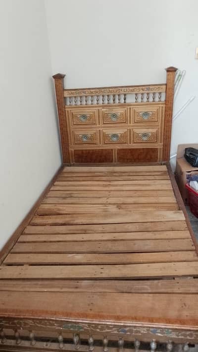 wooden single bed