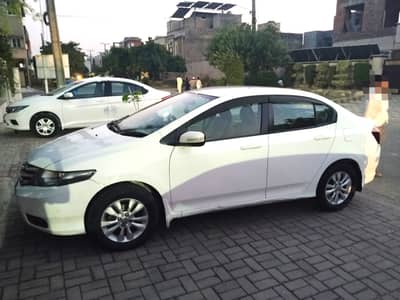 Honda City Car for Rent with Driver in Lahore. Family Tours & Weddings