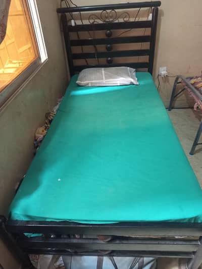 iron bed with mattress