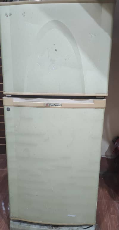 DAWLANCE FRIEDGE IN GOOD/ RUNNING CONDITION FOR SELL