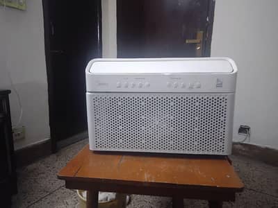 Midea window AC in perfect condition with a transformer