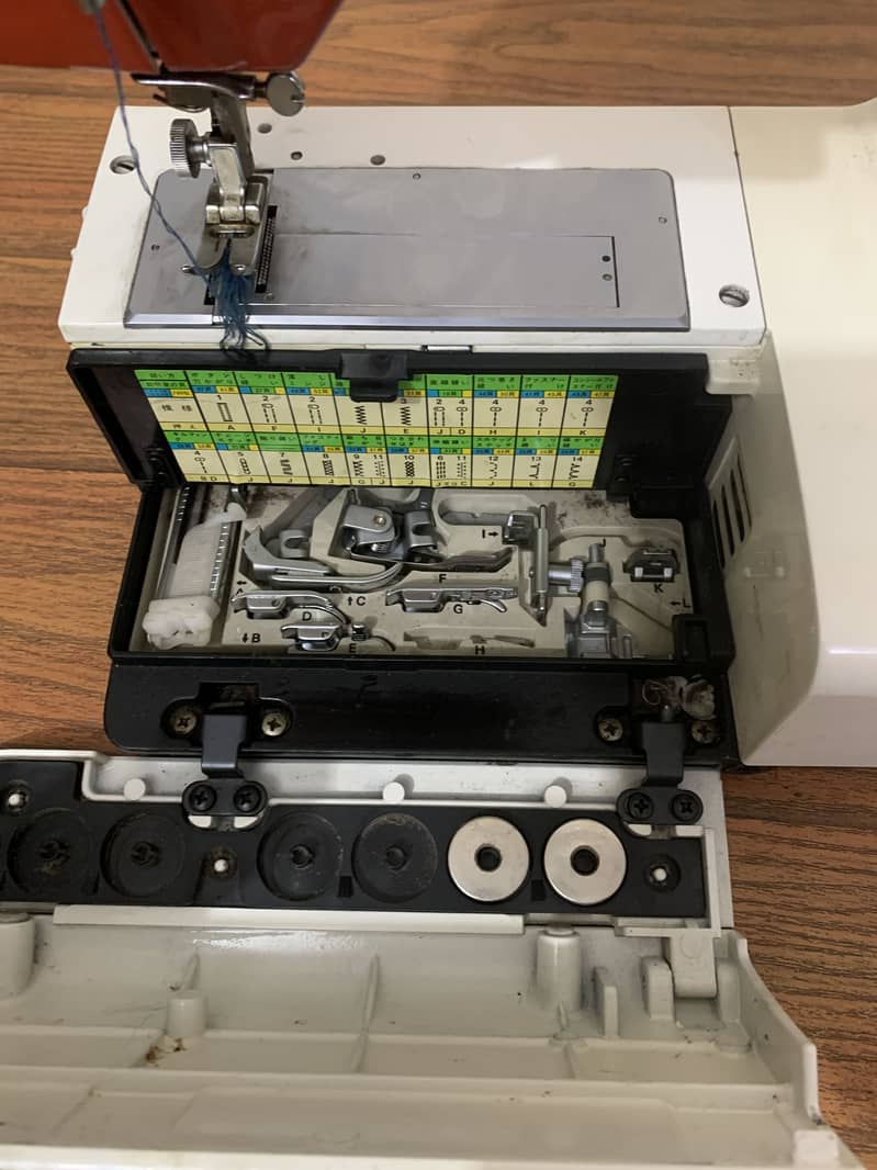 Embroidery swing machine 10