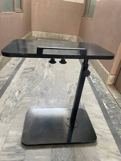 Height adjustable table