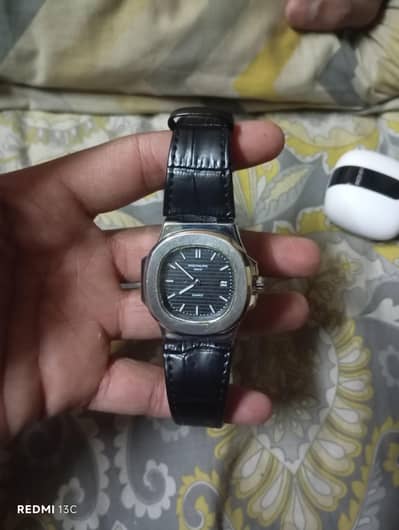 patek Phillips black strap watch