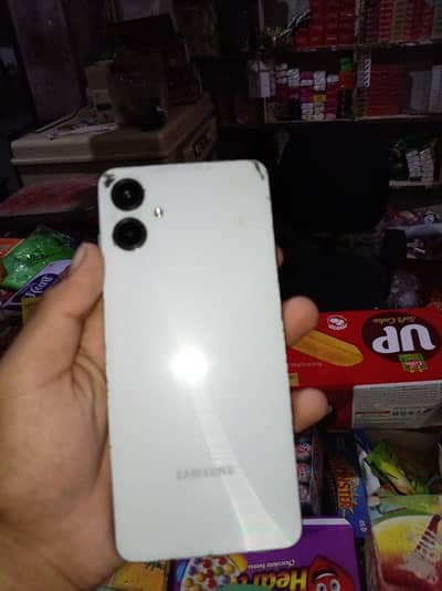 Samsung Mobile A06 with box and charging cale